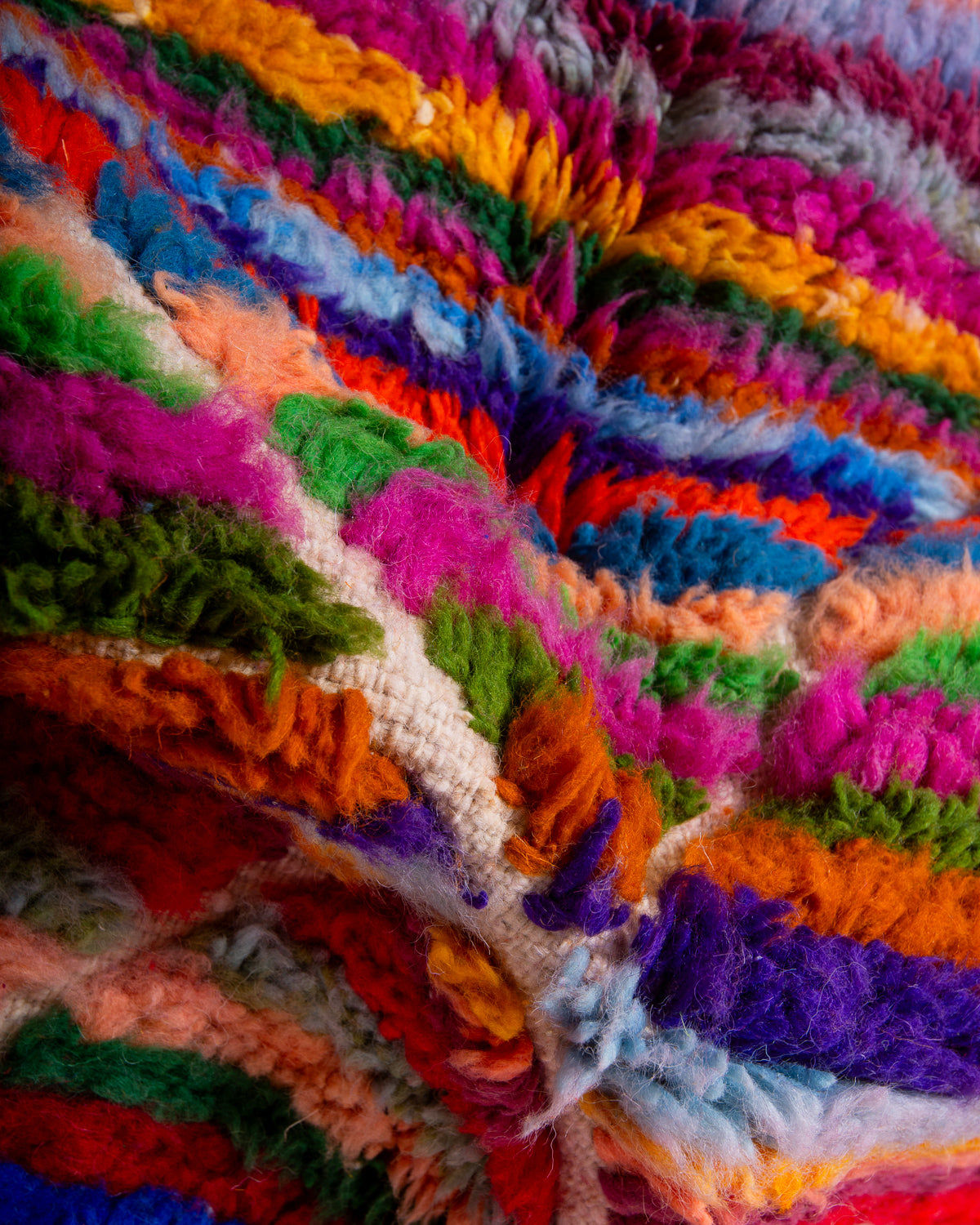 Modern, designer, handcrafted Berber rug from Morocco. Beniourain carpet with beautiful colours and patterns and fluffy wool texture.